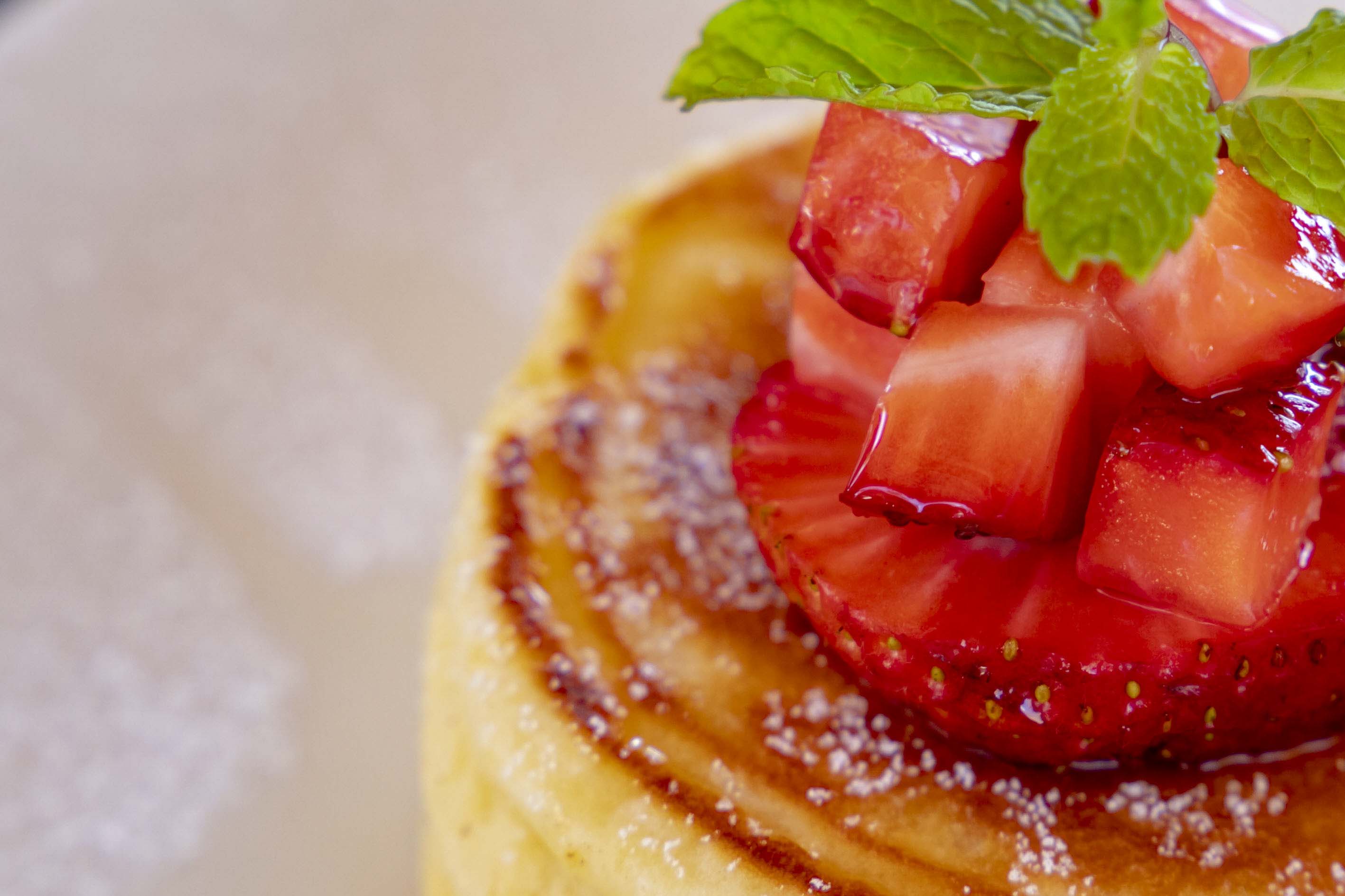 Ricotta pancakes topped with strawberry